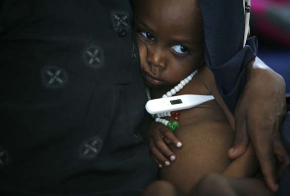 An Ethiopian child receives health check