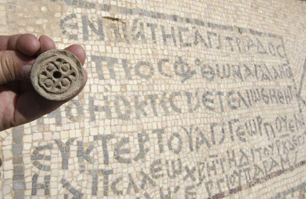 An artifact is shown at the site of the oldest churc h in the world in Jordan 