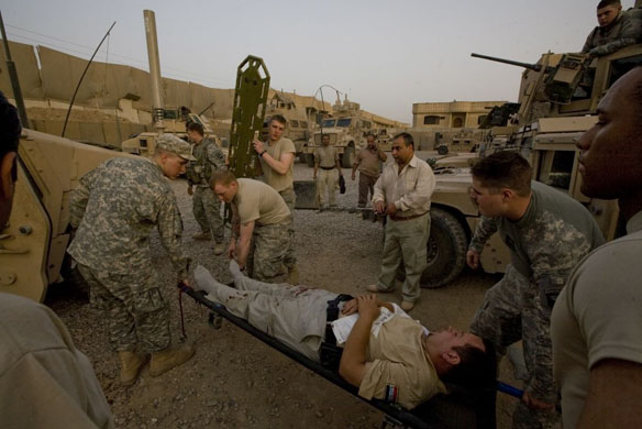 Injured Iraqi soldier is moved for medical treatment in Shulla
