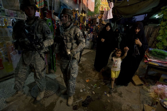 American troops patrol a market in a Shia area of Baghdad.