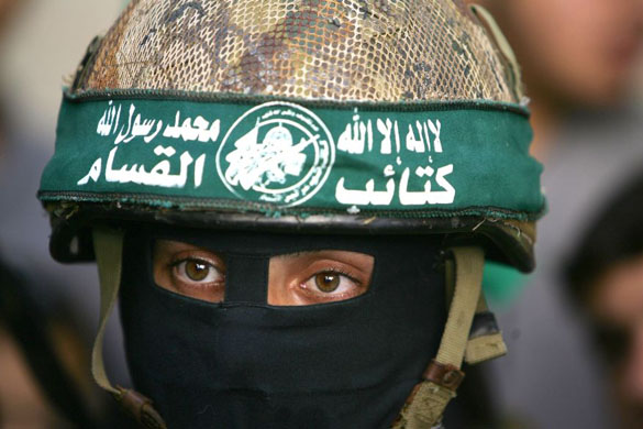 A militants from the Hamas movement takes part in a  press conference in the Jabalia refugee camp