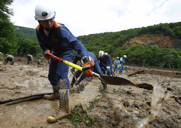 Rescuers search for missing persons in Kurihara