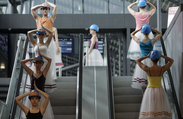 Schkeuditz, Germany: Members of Leipzig Dance Theatre rehearse their piece Escalators at the Leipzig/Halle airport, part of the Teater der Welt festival which opens on June 19