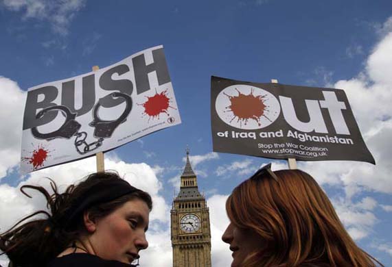 Anti-war protesters gather in Parliament Square before Bush's dinner with Gordon Brown in Downing Street