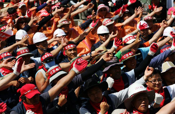 Construction workers participate in a general strike rally in Seoul 