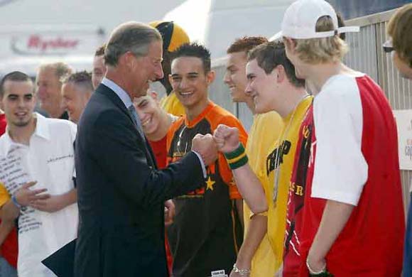The Obama fist-bump is the new high-five, Prince William at a community college in Newcastle