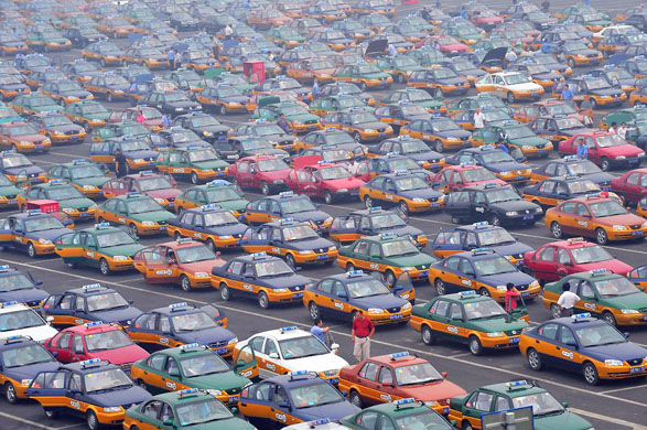 Beijing, China: Taxis queue for passengers at the no 3 terminal building of the international airport