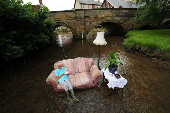 Pickering, UK: Resident recreate the scenes they faced in the floods of last year