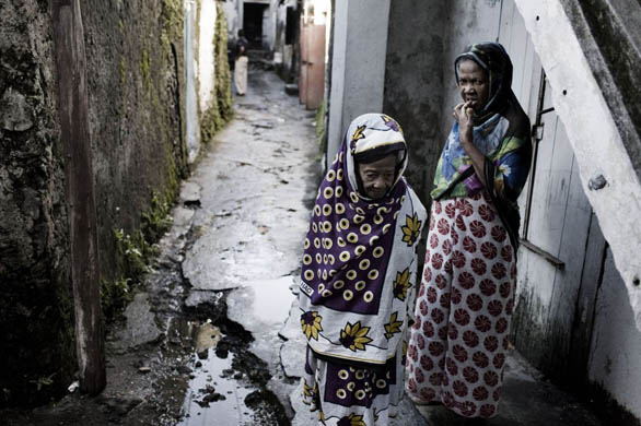 Moroni, Union of Comoros: Two women stand in a narrow street