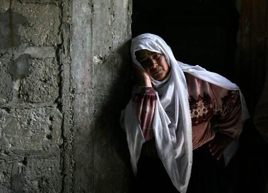 A Palestinian woman mourns the death of Said Abu Hadaf