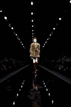 A model takes to the catwalk wearing a creation by Japanese fashion brand Royal Chie