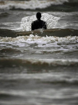 One of the life-size body cast statues of 'Another Place'
