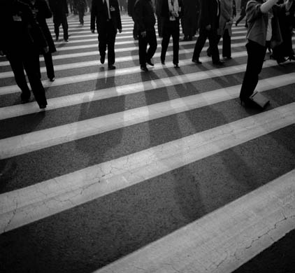 Delegates walk across Tiananmen Square