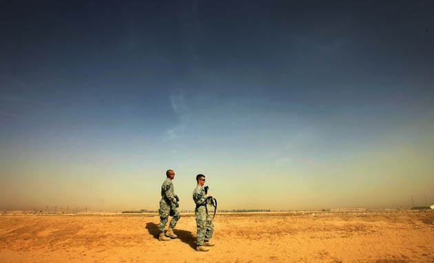 Baghdad, Iraq: US Army soldiers from 1st  Battalion 38th Infantry Regiment look out toward the Diyala region