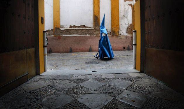Seville, Spain: A hooded penitent from the 'San Esteban' brotherhood