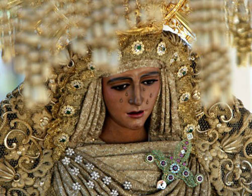 A statue during the traditional Virgin of the 'La Esperanza de Triana' brotherhood procession