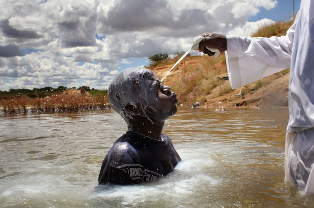 A new church member is baptized in milk after church leaders decided he was possessed by evil spirits