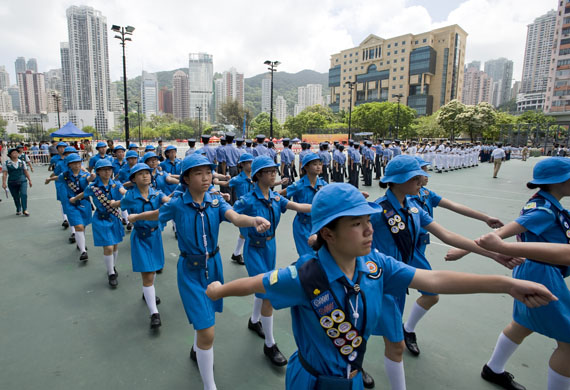 Hong Kong, China: The Hong Kong girl guides practice for a parade