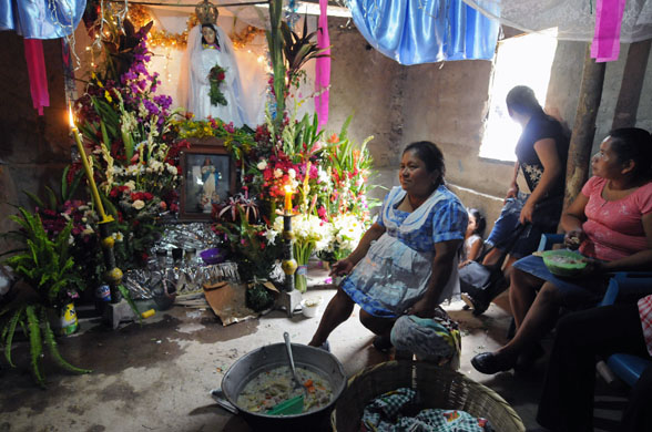 Panchimalco, El Salvador: A shrine to the Virgin Mary during preparations for the Flower and Palm festival