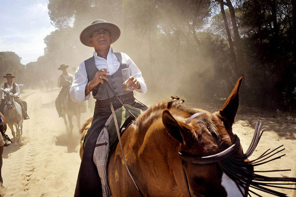 Sanlucar de Barrameda, Spain: Pilgrims ride to El Rocio shrine in Donana national park during the annual El Rocio pilgrimage