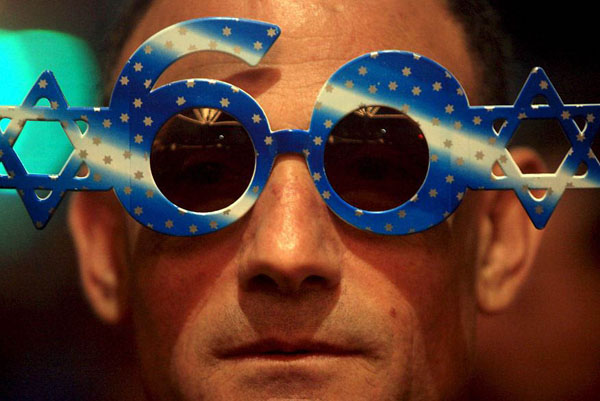Tel Aviv, Israel: A man takes part in celebration of the 60th Independence Day