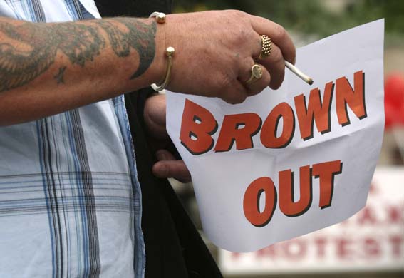 A fuel protester holds a sign during a demonstration in London 