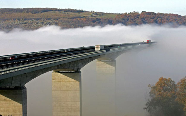 The Koroshegy bridge is blanketed in fog      