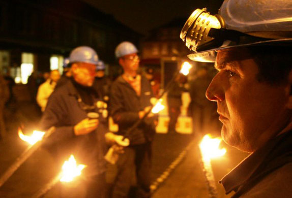 Members of the biggest German industrial trade union strike for higher wages