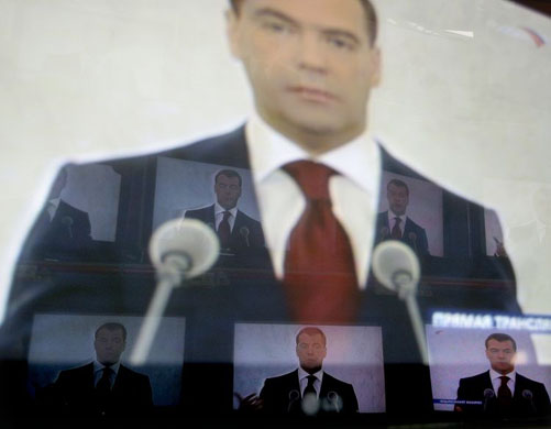 Moscow, Russia: Television screens in a department store show president Dmitry Medvedev delivering a speech from the Kremlin