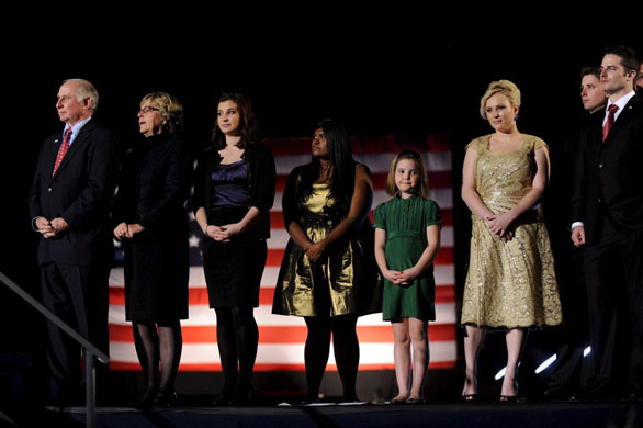 The McCain and Palin families stand on stage during their election night rally