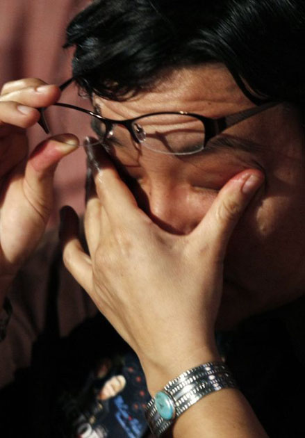 A McCain supporter reacts to his loss   