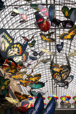 Moscow, Russia: Replicas of butterflies are fixed on a net at a department store near Red Square