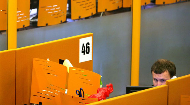 Moscow, Russia: A traider for Moscow Interbank Currency Exchage speaks on the phone during a trade session