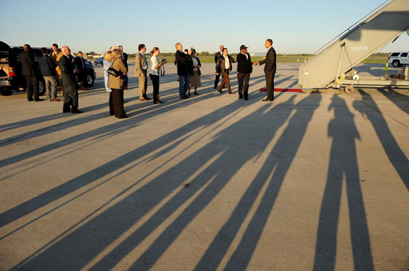 Lansing, US: Barack Obama shakes hands with supporters