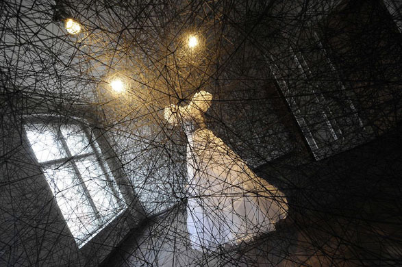 Berlin, Germany: Chiharu Shiota's installation in the 'Torstrasse 166 - House of Imagination' which features 12 flats, each taken over by a different artist
