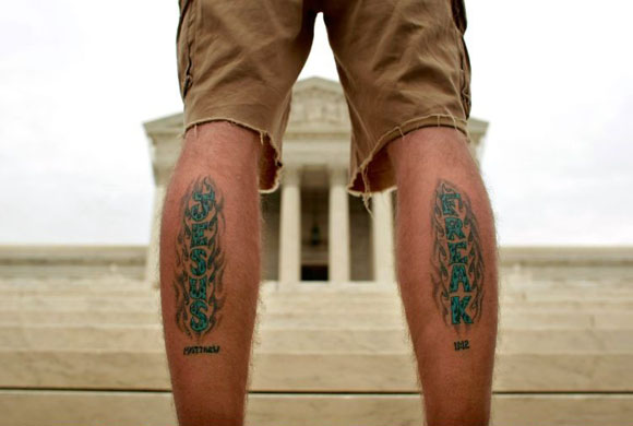 Washington, US: Anti-abortion demonstrator Derrick Sanderson stands in front of the Supreme Court on the first day of the court's new term