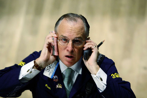 New York, US: A trader works on the floor of the New York Stock Exchange