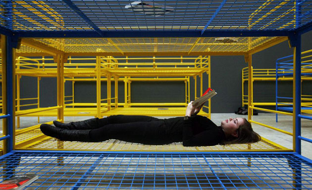 London, UK: A woman poses for the media in an interactive art exhibition entitled 'TH.2058' by Dominique Gonzalez-Foerster, at the Tate Modern gallery