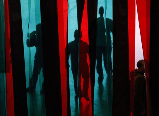 London, UK: Visitors to Tate Modern at an installation by Dominique Gonzalez-Foerster entitled 'TH.2058'