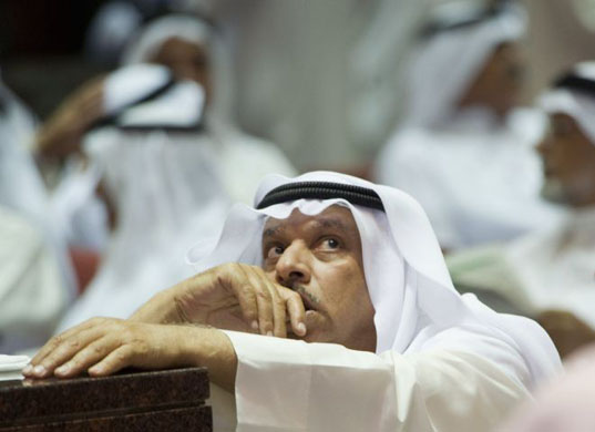 Kuwait City, Kuwait: An investor keeps track of stock prices