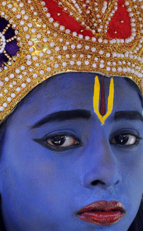 Colombo, Sri Lanka: A child is dressed as Hindu god Krishna during the Sri Sri Jagannath Chariot Festival, known locally as ratha yathra, at Shri Shri Radha Krishana temple