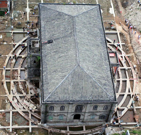 Fuzhou, China: The Cathedral of St Dominic is being turned 90 degrees and will be moved south to make way for urban construction.