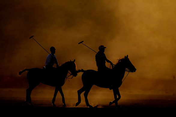 Dirab, Saudi Arabia: Saudi and foreign players take part during a Polo game