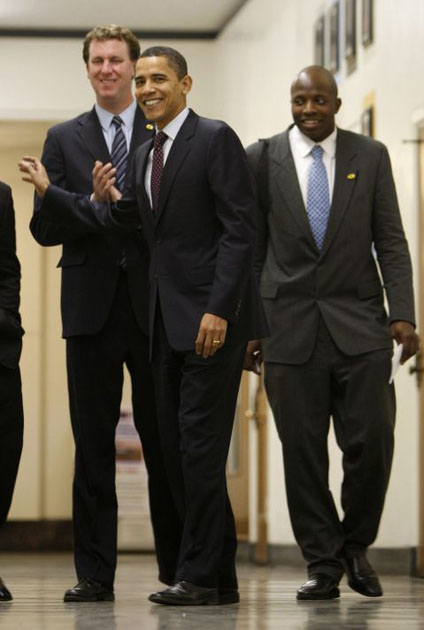 Obama walks backstage with Reggie Love and Marvin Nicholson in Los Angeles