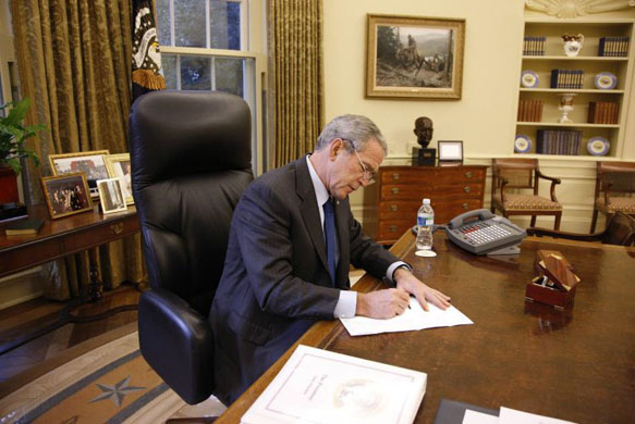 President Bush voting in oval office