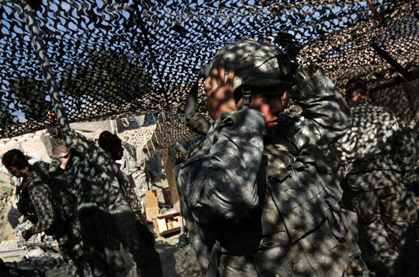 Korengal Valley, Afghanistan: US army soldiers prepare to head out on a mission