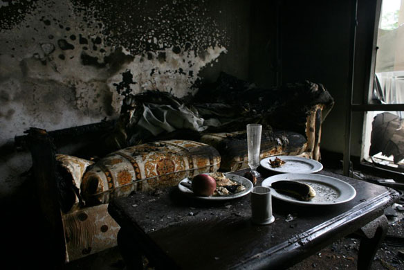 emains of a room service meal in one of the burnt-out rooms of the devasted Marriott Hotel in Islamabad