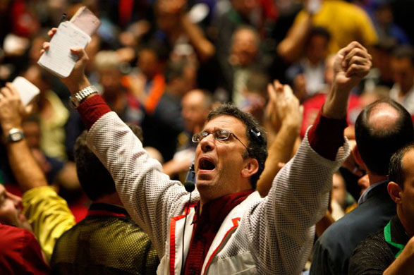 Chicago, US: A trader signals an offer in the S&P 500 stock index futures pit at the Chicago Board of Trade