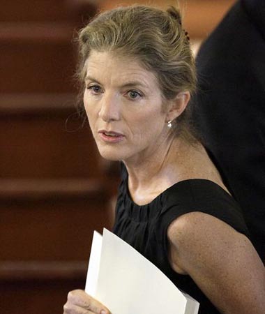 Caroline Kennedy, daughter of John Kennedy, enters the church for her aunt's services