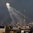 A smoke bomb explodes over the northern Gaza Strip